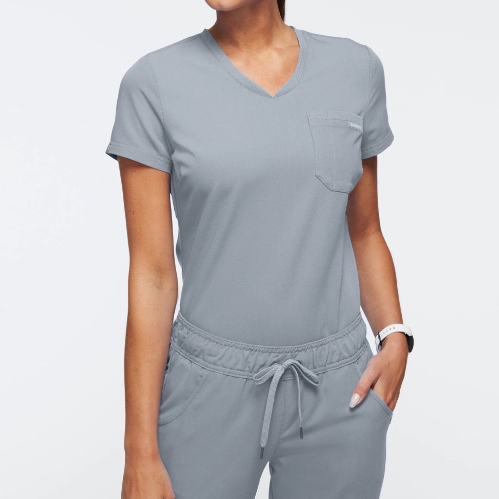 Jaanuu classic front chest pocket v neck scrub top light grey small
